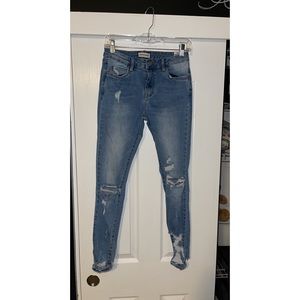 Queen hearts skinny jeans ripped size large